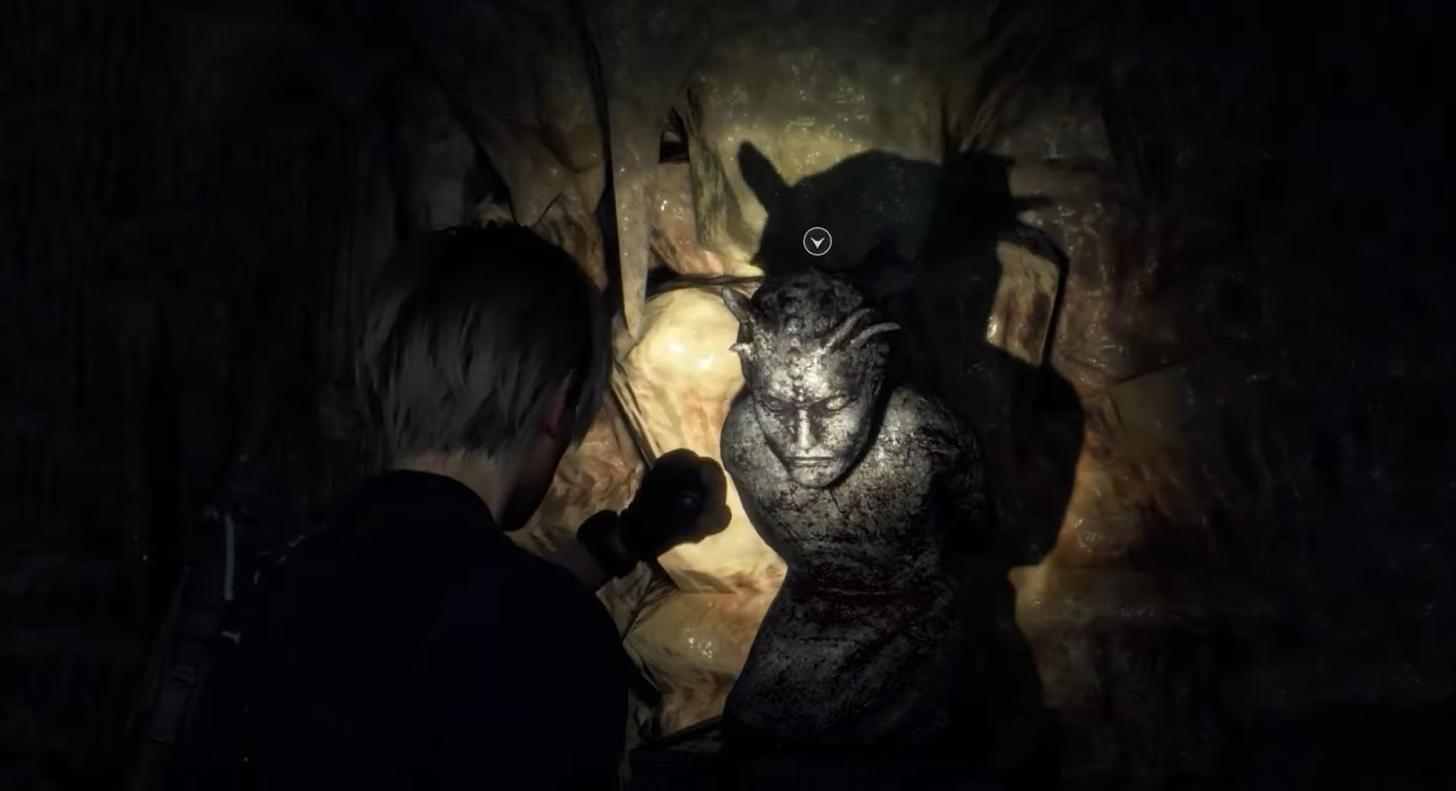 Resident Evil 4 Remake church key puzzle explained - player looking at statue
