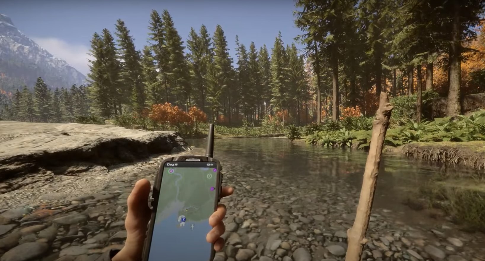 Water collector Sons of the Forest explained player at river holding phone and stick